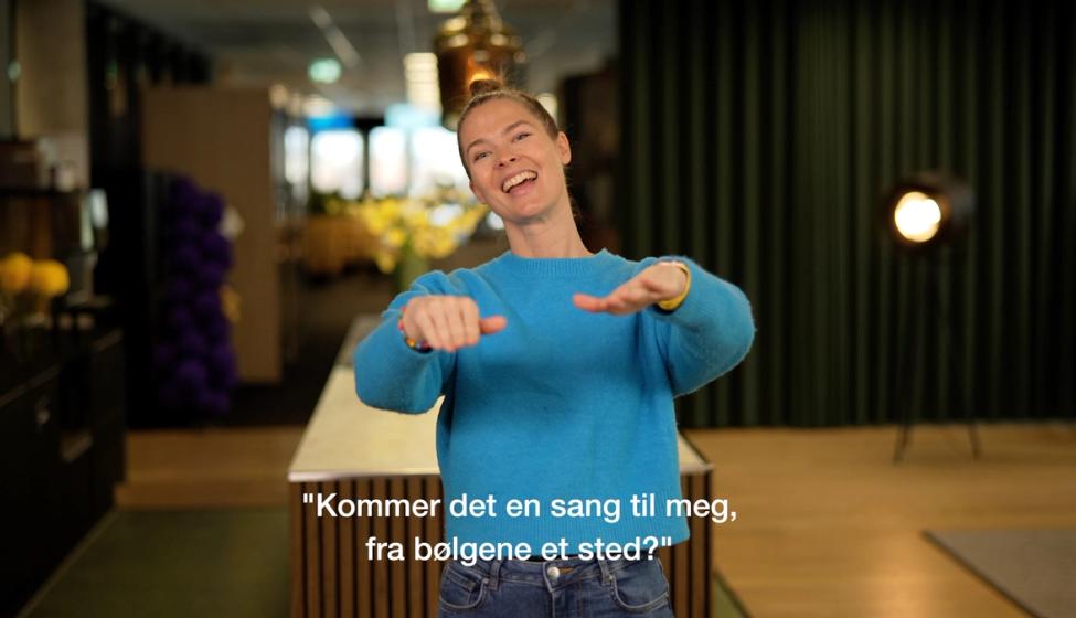 "Som bølger" med tegnsang