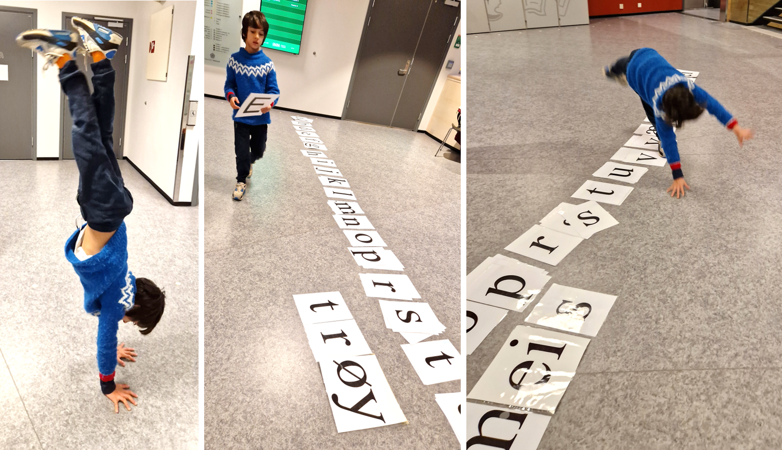 Elev som pusler med store bokstavkort på gulvet