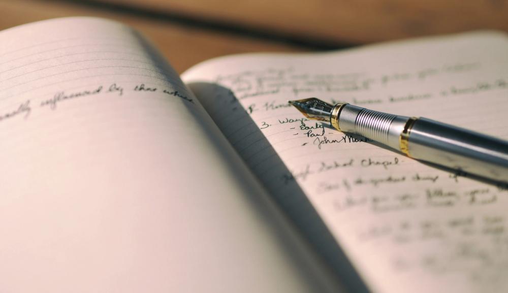 Skrivebok og penn