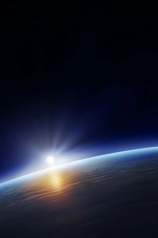 Space view of sun rising over the earth to illustrate my daily logo design challenge