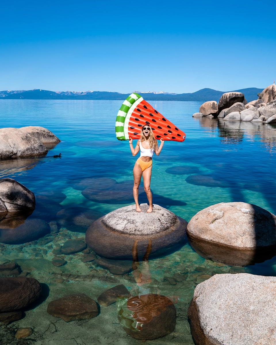 Woman with pool floaty in Lake Tahoe