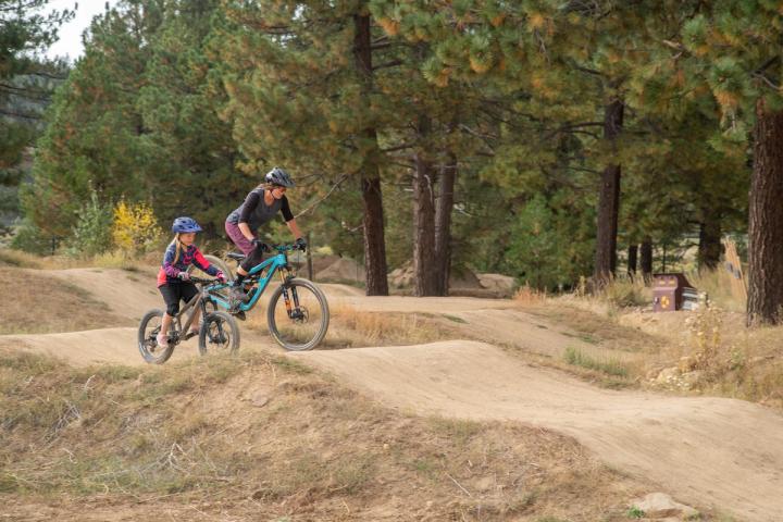 Mother and daughter riding bikes at Truckee bike park