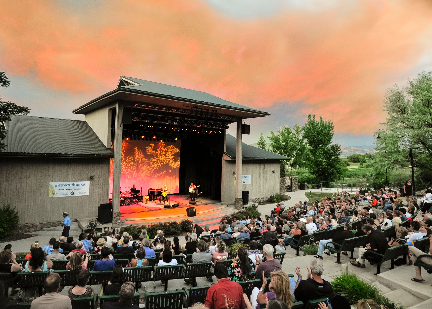 Stage and audience at Bartley Ranch for an Artown cocnert