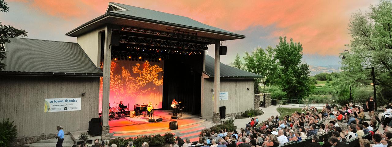 Stage and audience at Bartley Ranch for an Artown cocnert