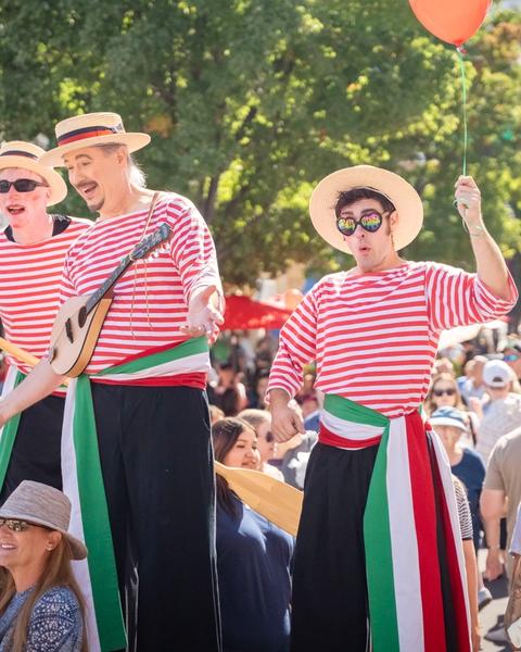 Stilt walkers at the Great Italian Festival