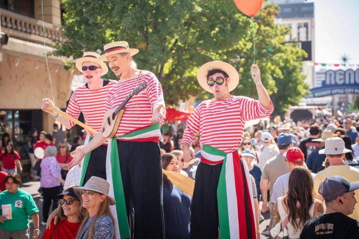 Stilt walkers at the Great Italian Festival
