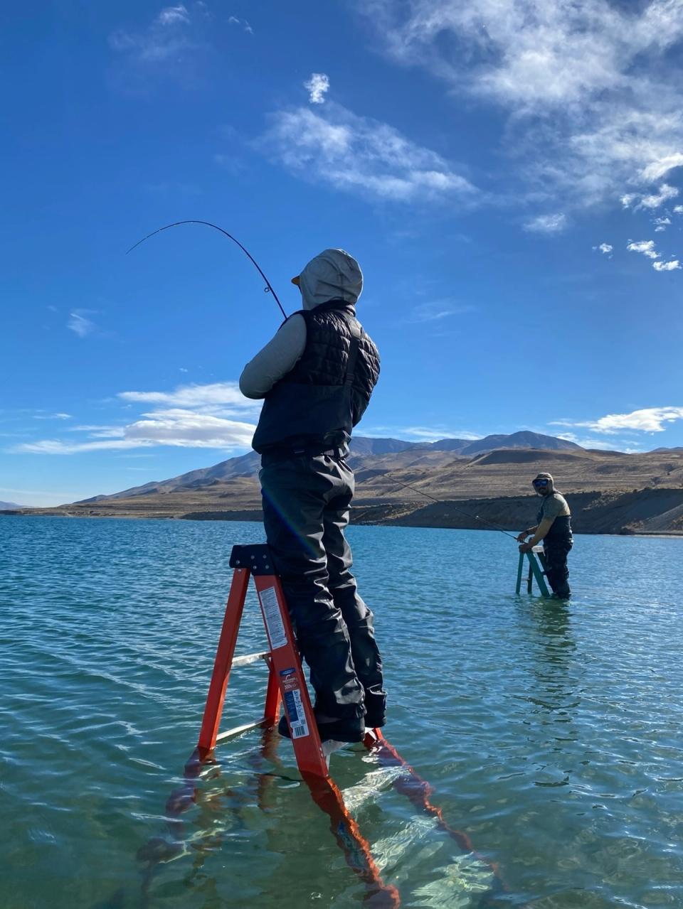 Standing on ladders to fish in Pyramid Lake