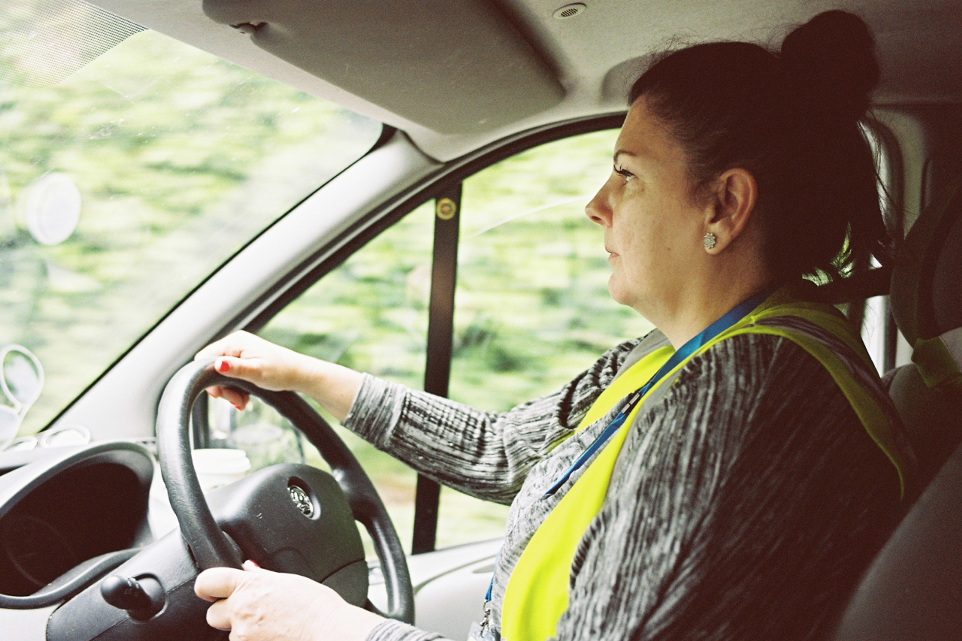 van delivery driver driving on her shift