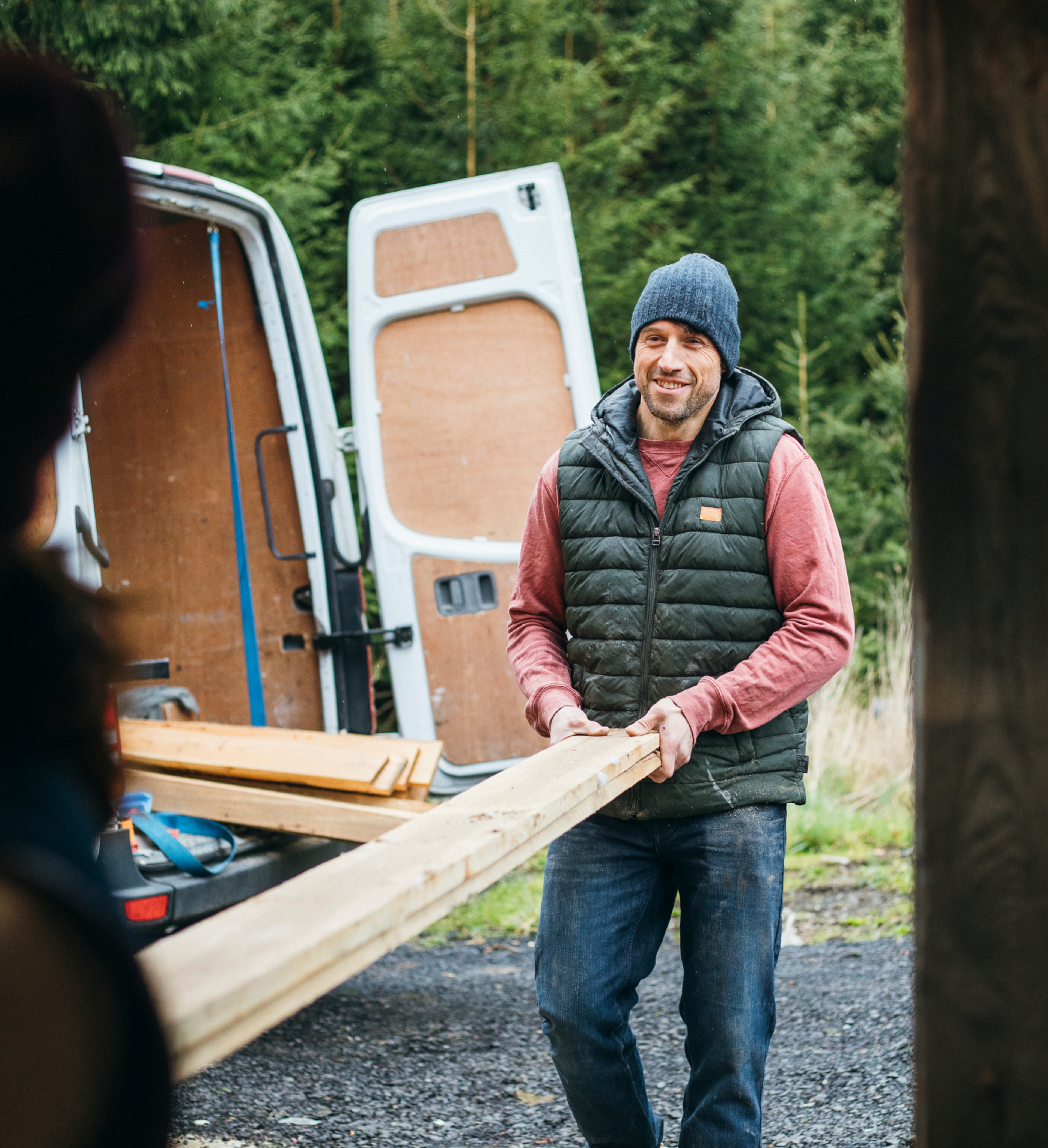 Happy Zego van insurance customer carrying tools from his van