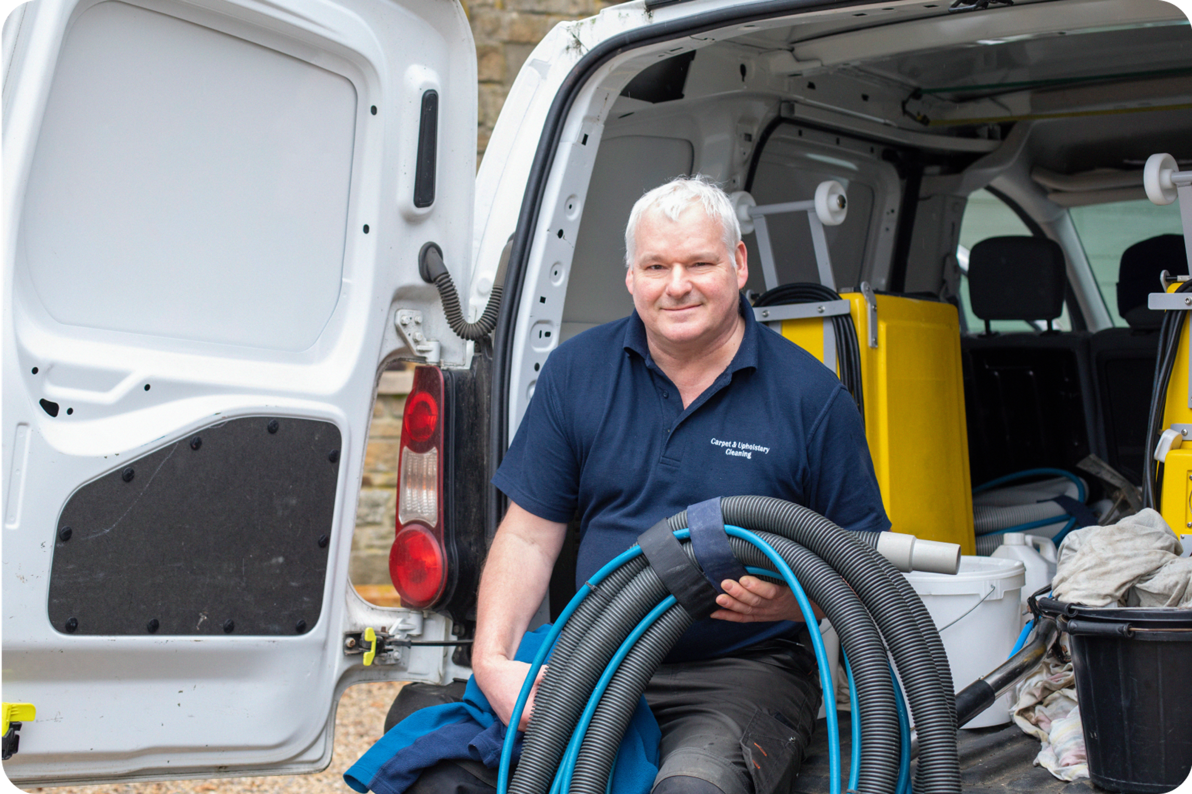 Zego business van driver sitting in the back of this van