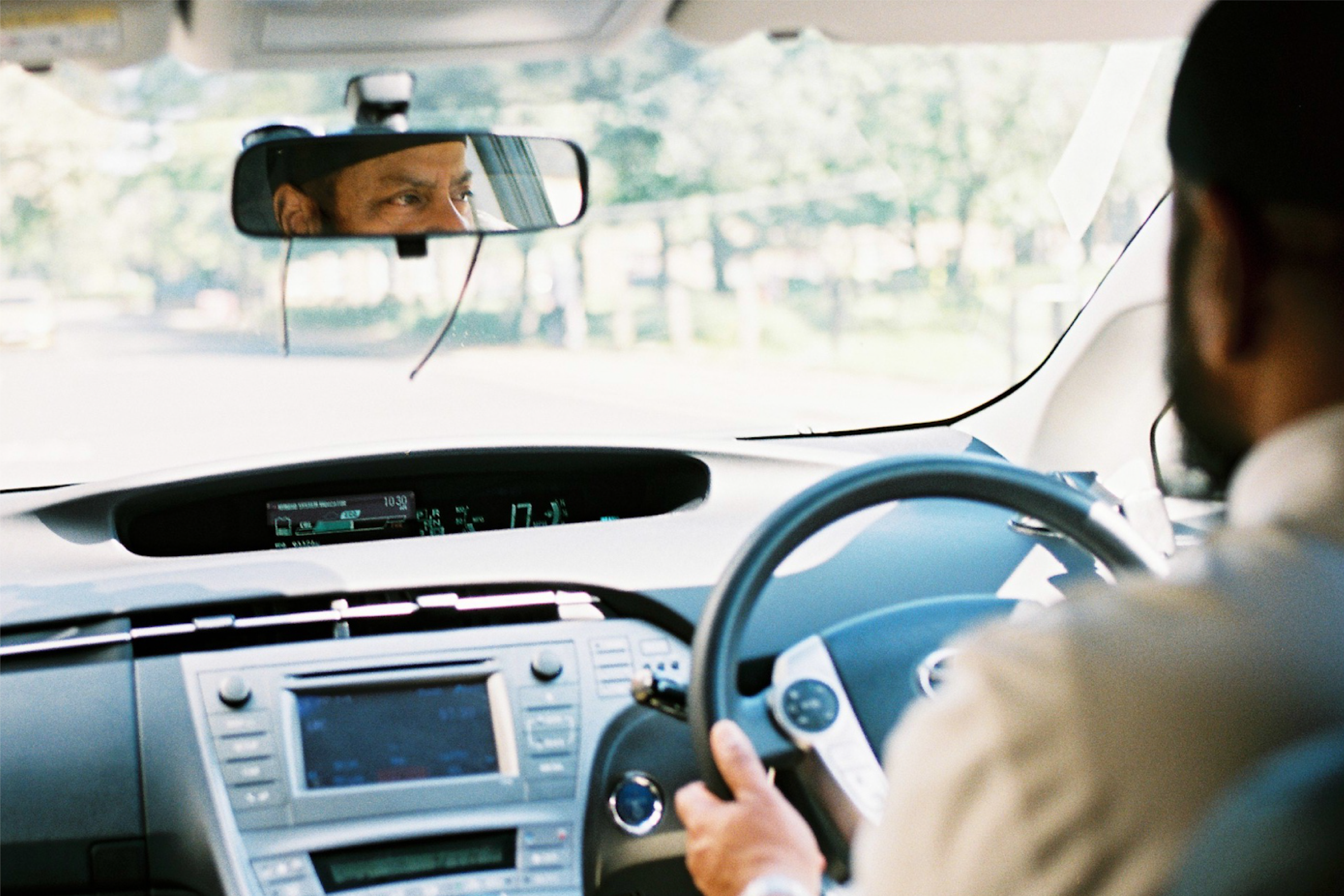 man driving his taxi