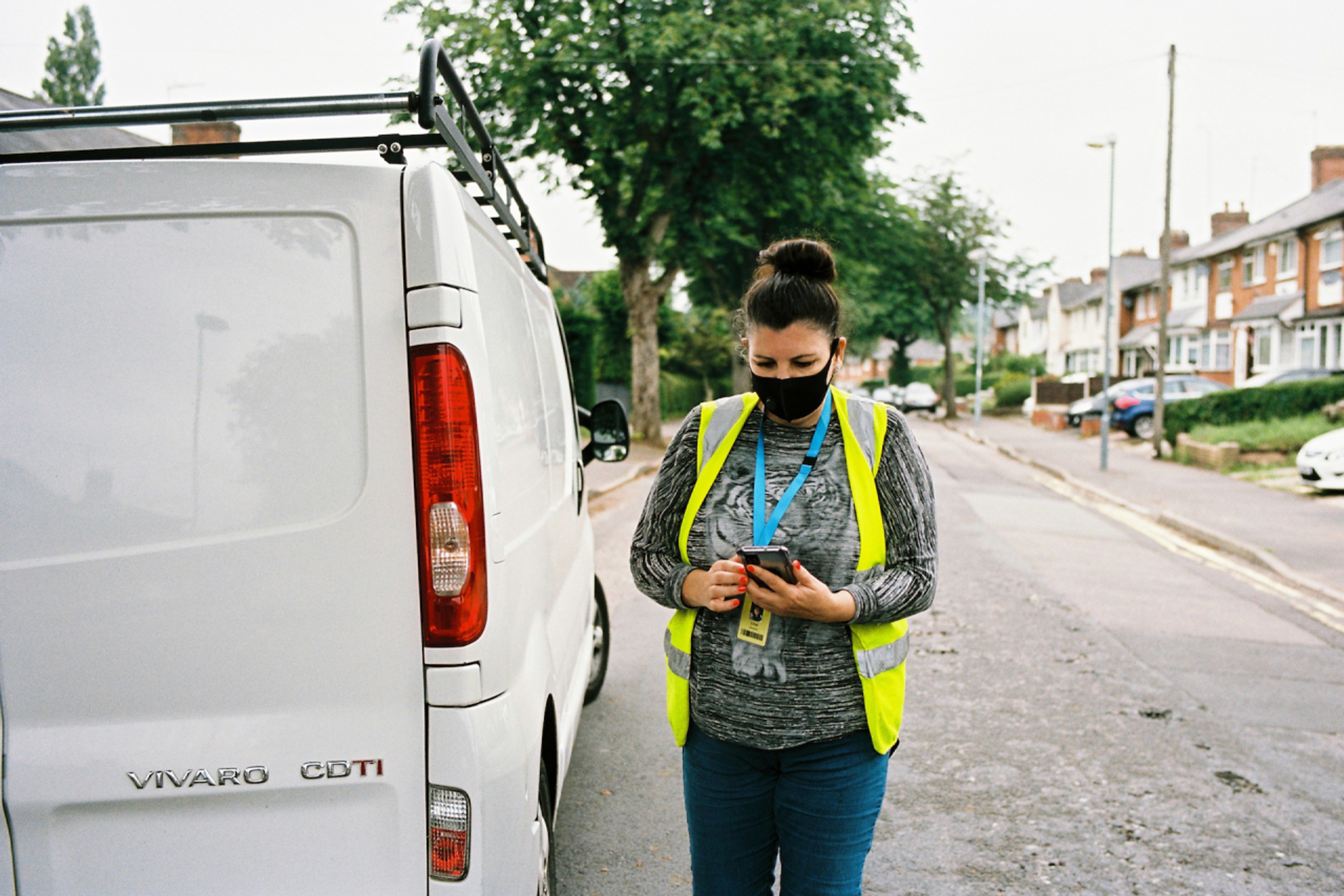 courier driver planning route on phone