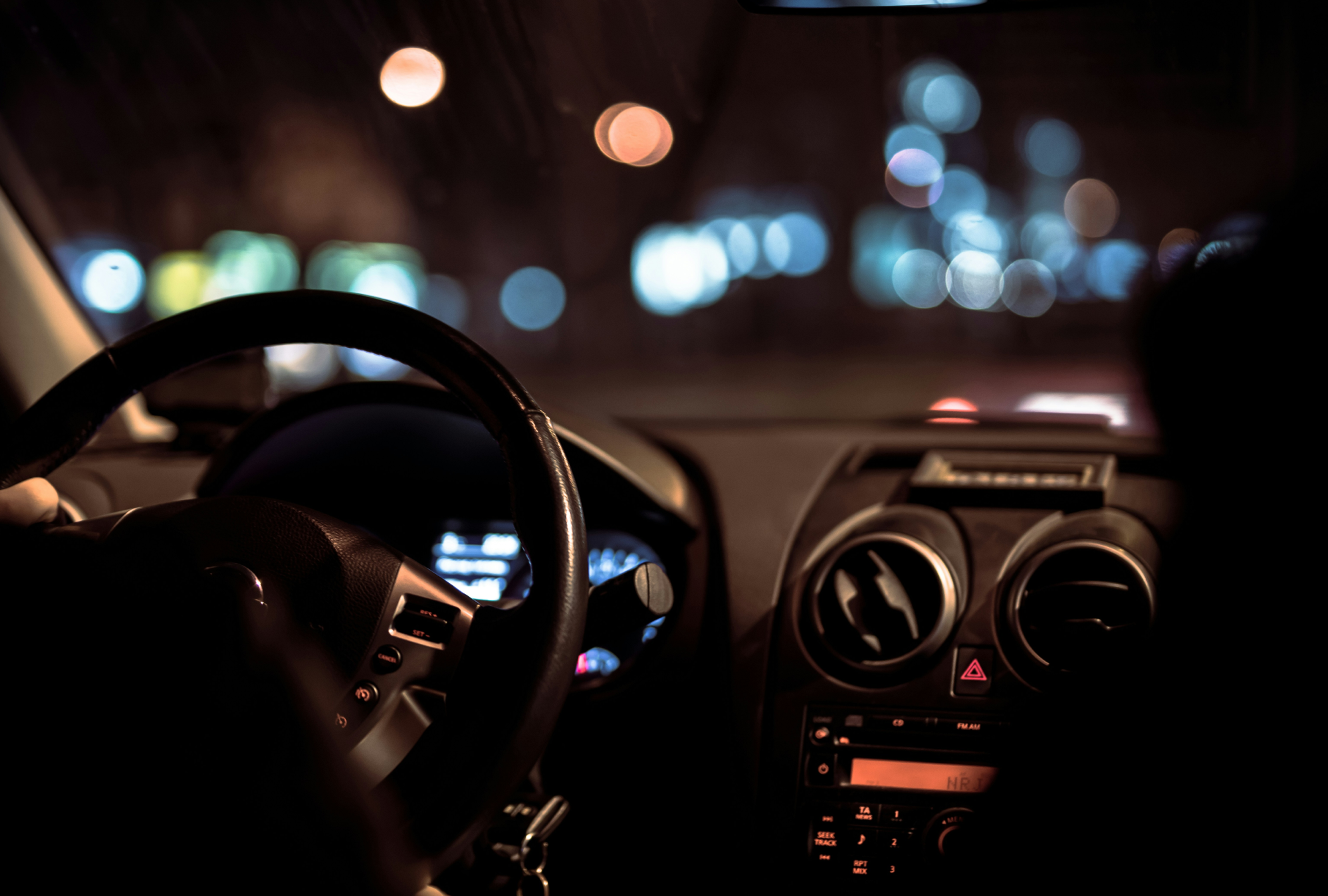 Driver travelling at night in car