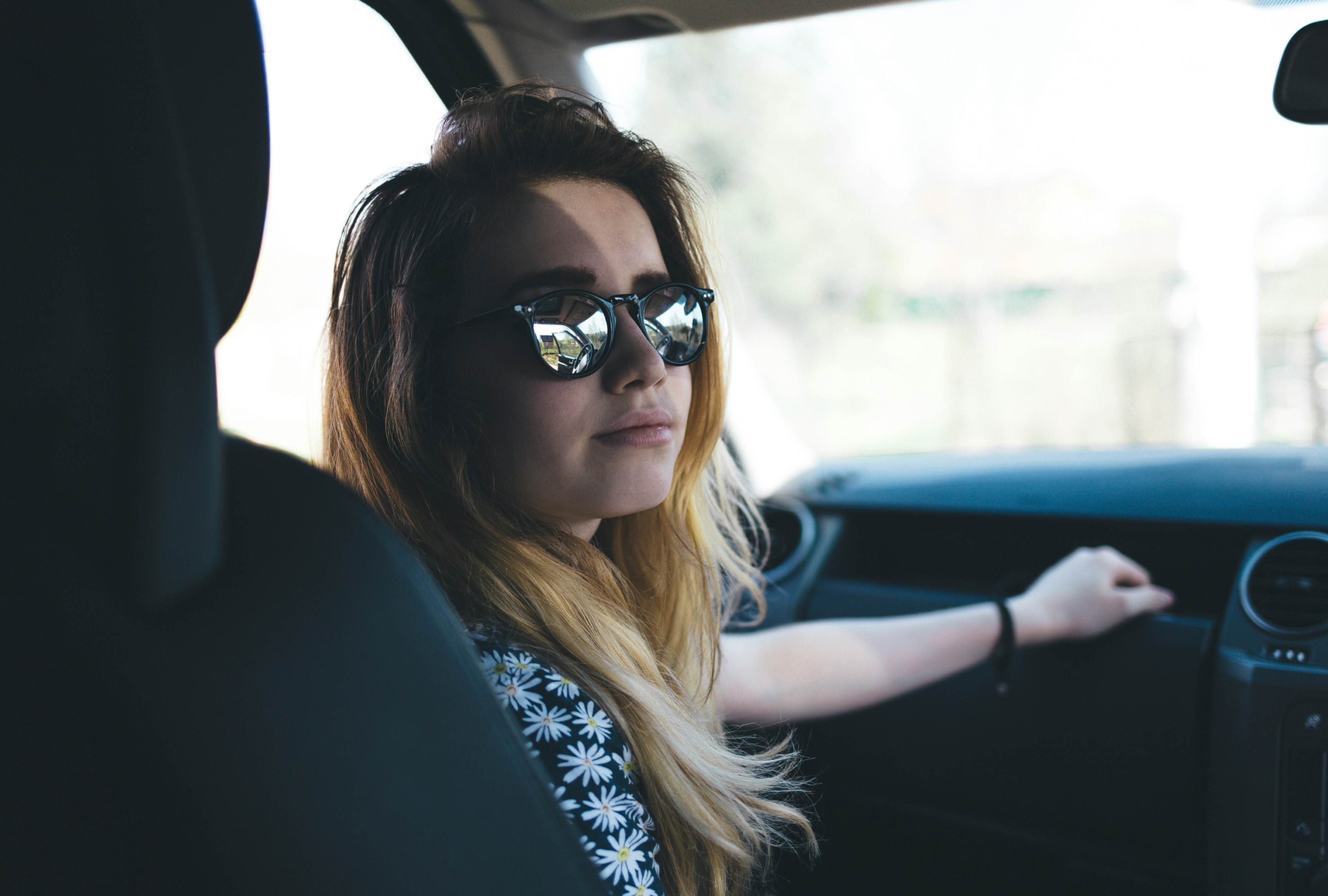 Passenger in parked car