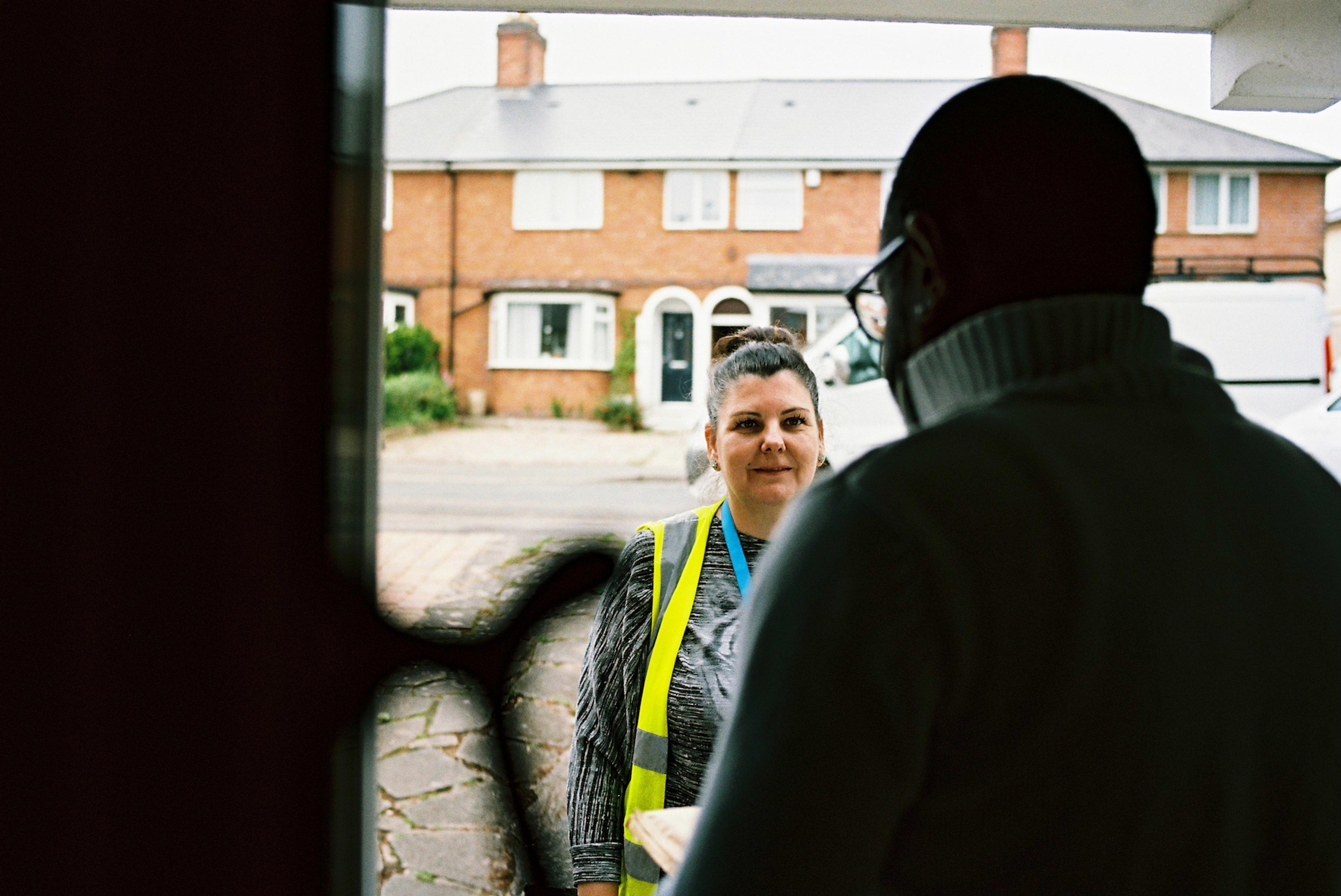 Amazon driver delivering a parcel