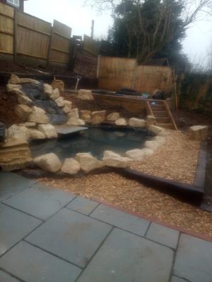 paving with pond and water-feature