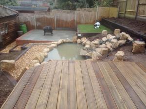 decking with pond and water feature