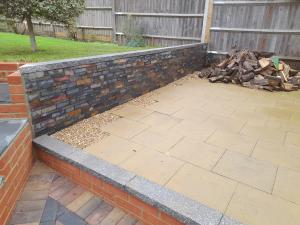 paving with slate retaining wall