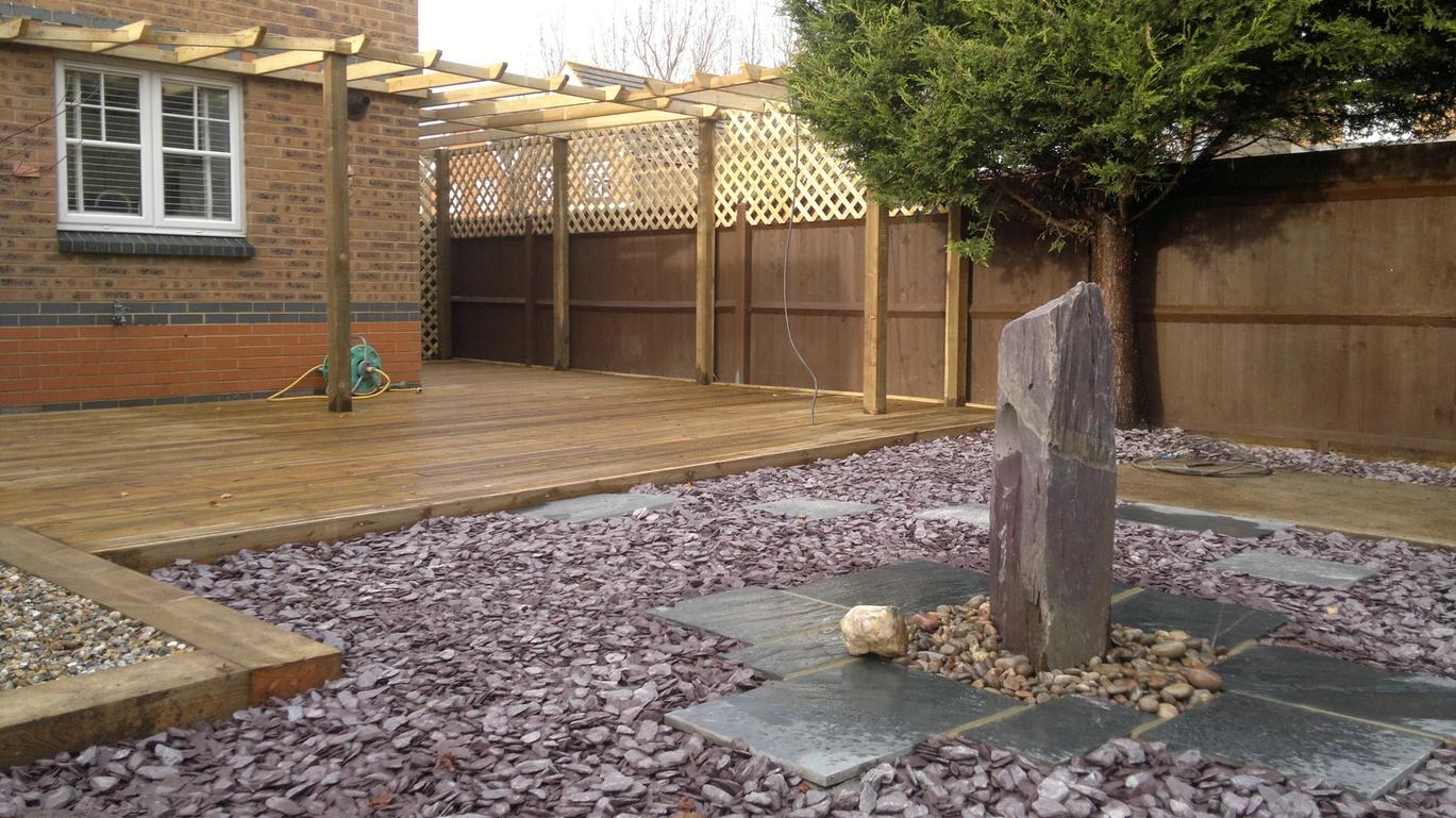 patio with pergolas and water feature