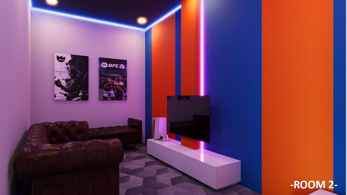 Private PS5 gaming room 2 at GameHub Bayan Lepas, Penang, with 4K TV and sofa lounge seating