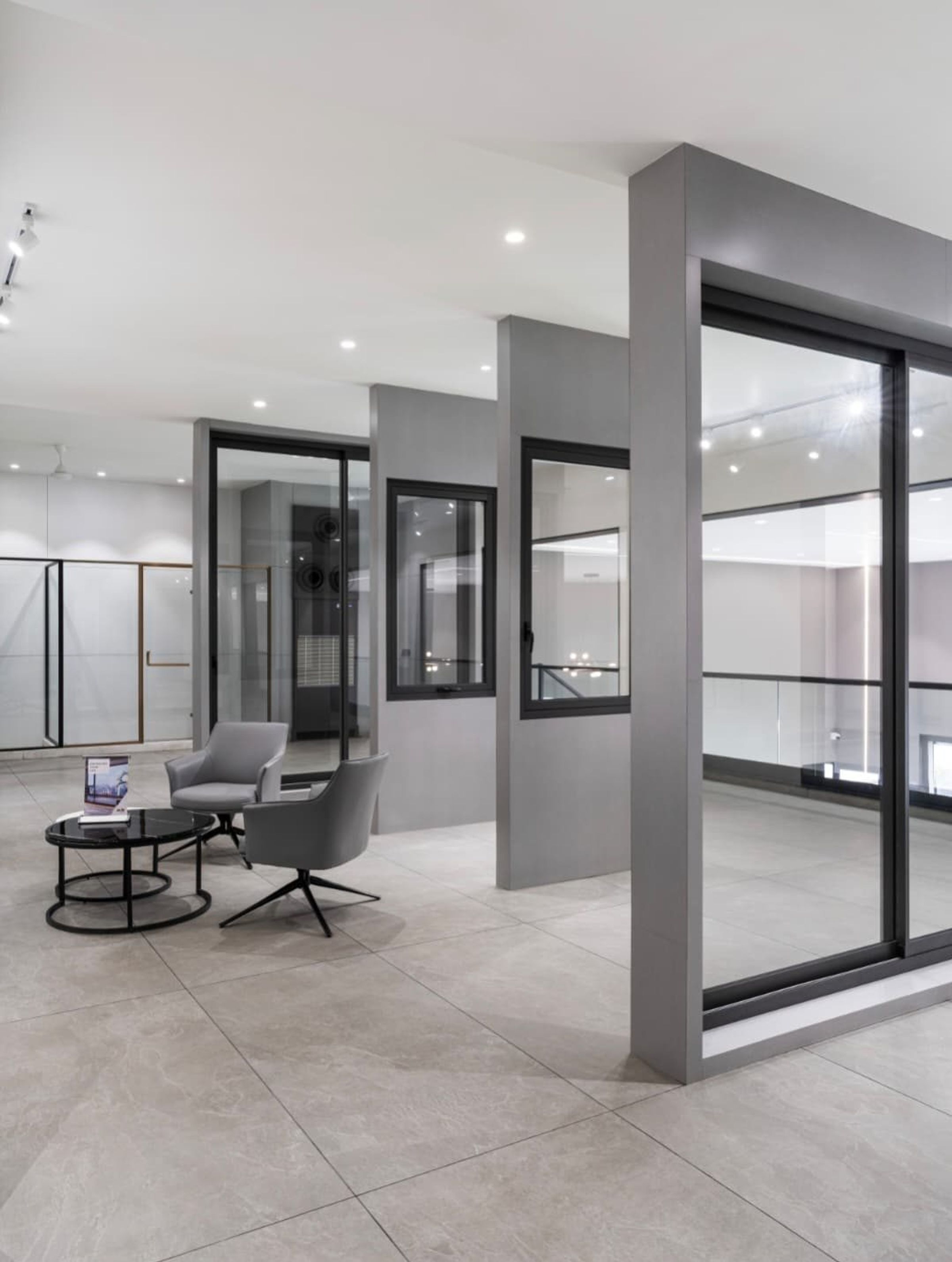 Display units with sliding and hinged glazed systems