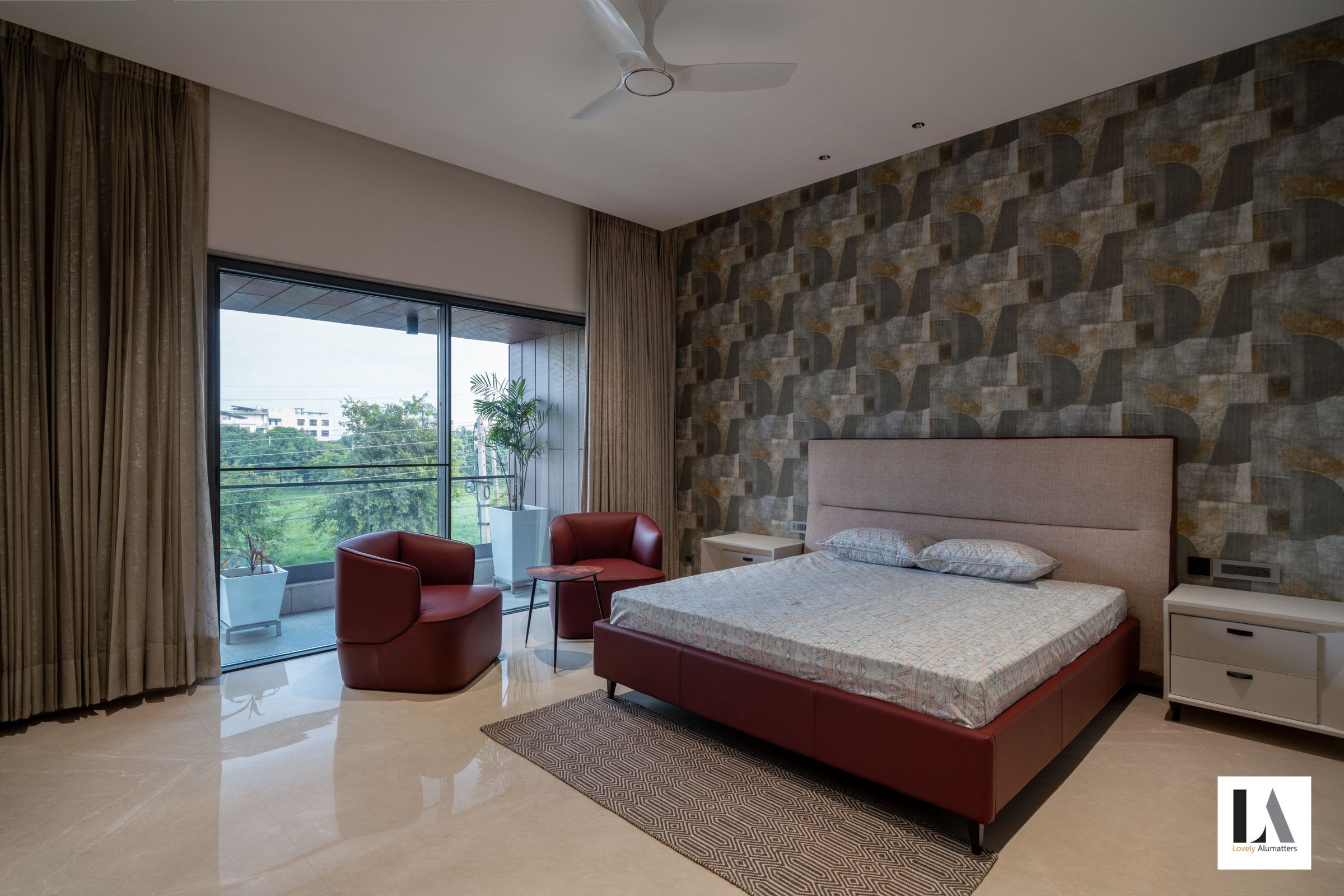 Bedroom with sliding glass doors to a planted balcony