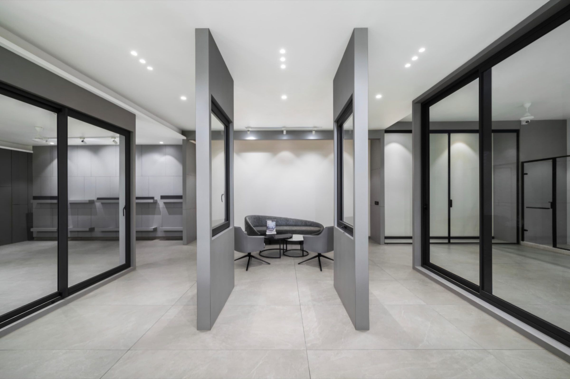 Sliding door displays between grey pillars
