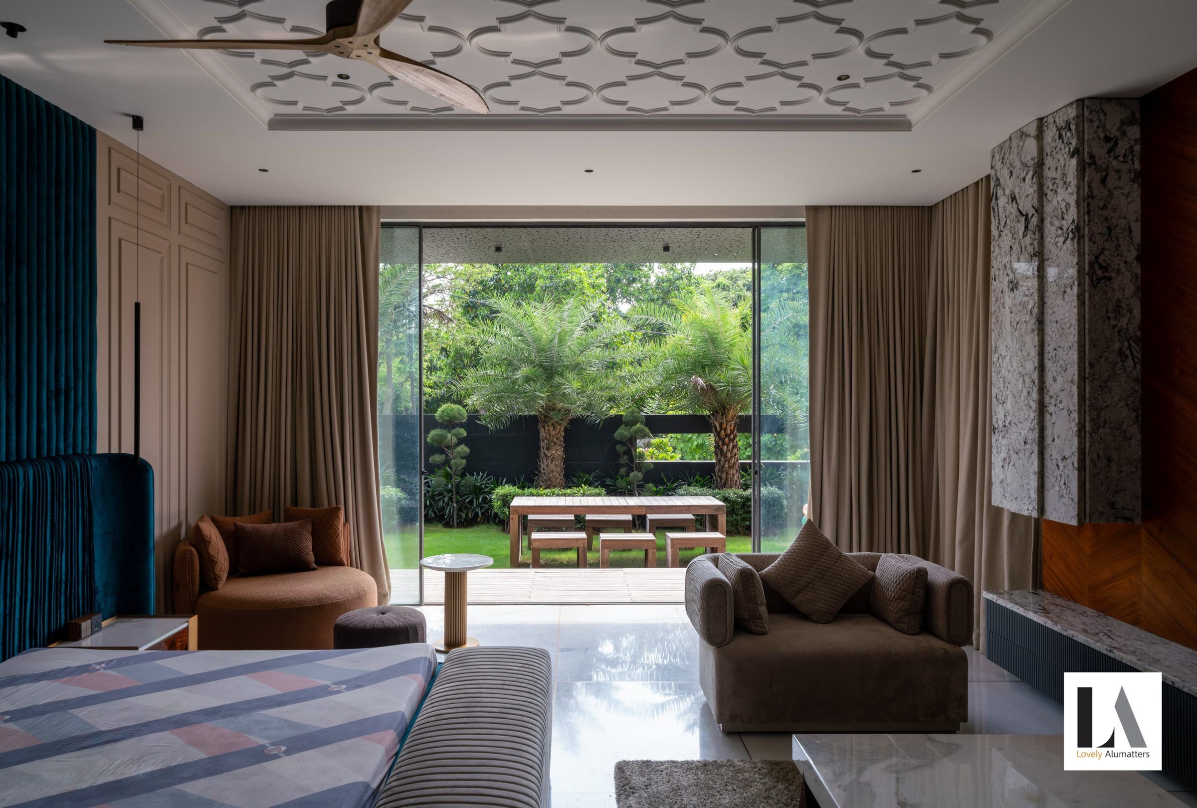Bedroom with a wide glazed opening to the garden