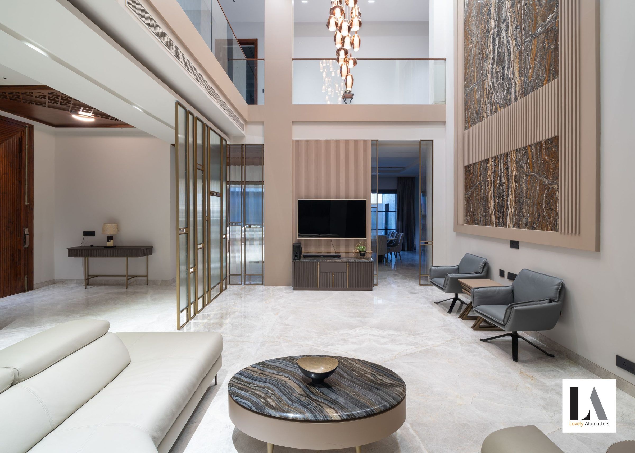 Double-height lounge with a glazed gallery level above