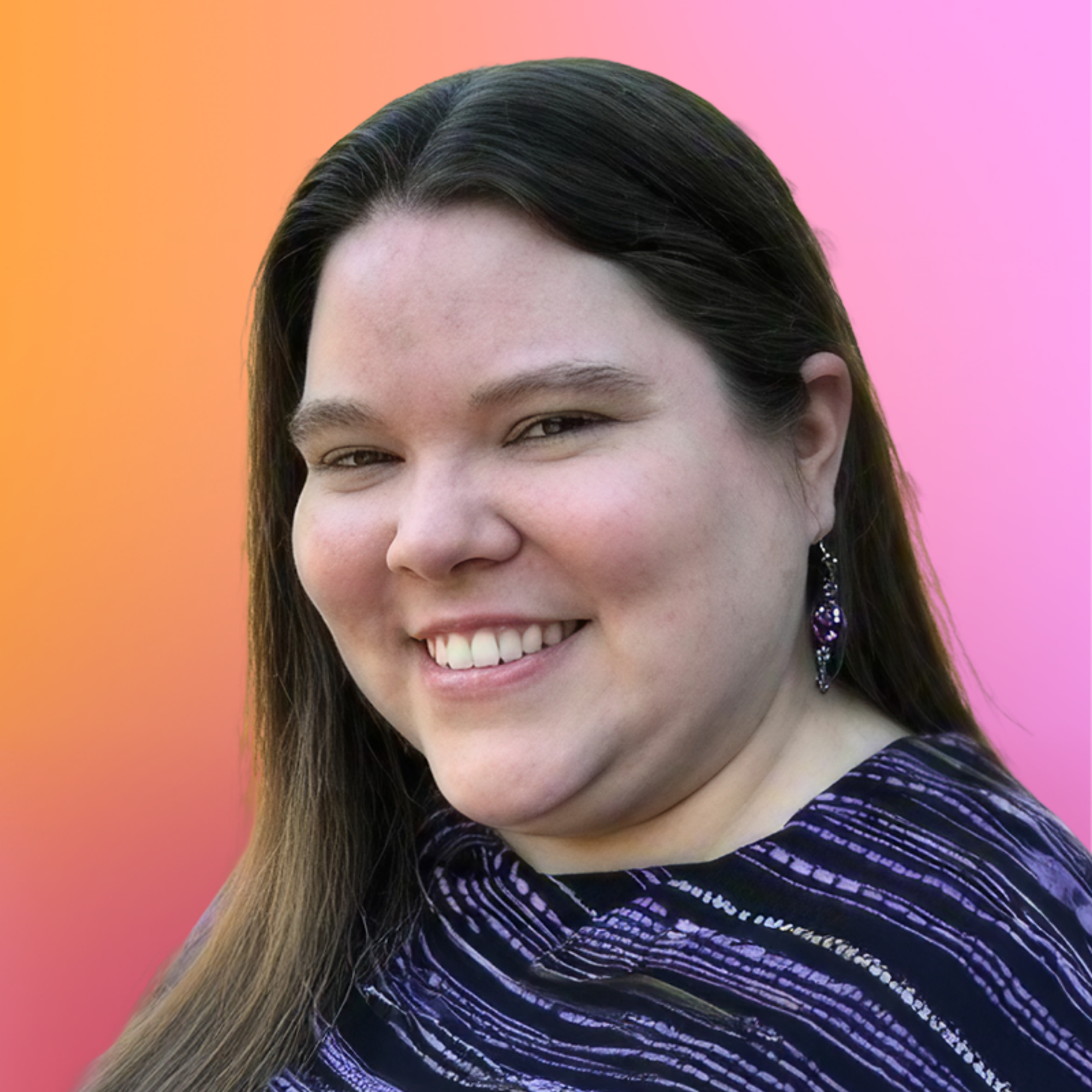 A woman with long hair smiles at the camera, wearing a patterned top and earrings, against a gradient pink and orange background.