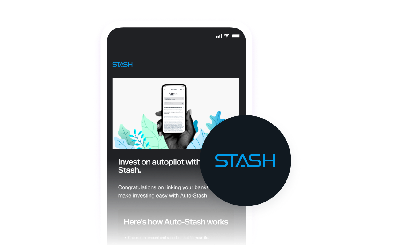 スマートフォンに表示されたStashアプリ。画面には「自動積み立てで自動運転投資」のテキストとStashのロゴが映っている。