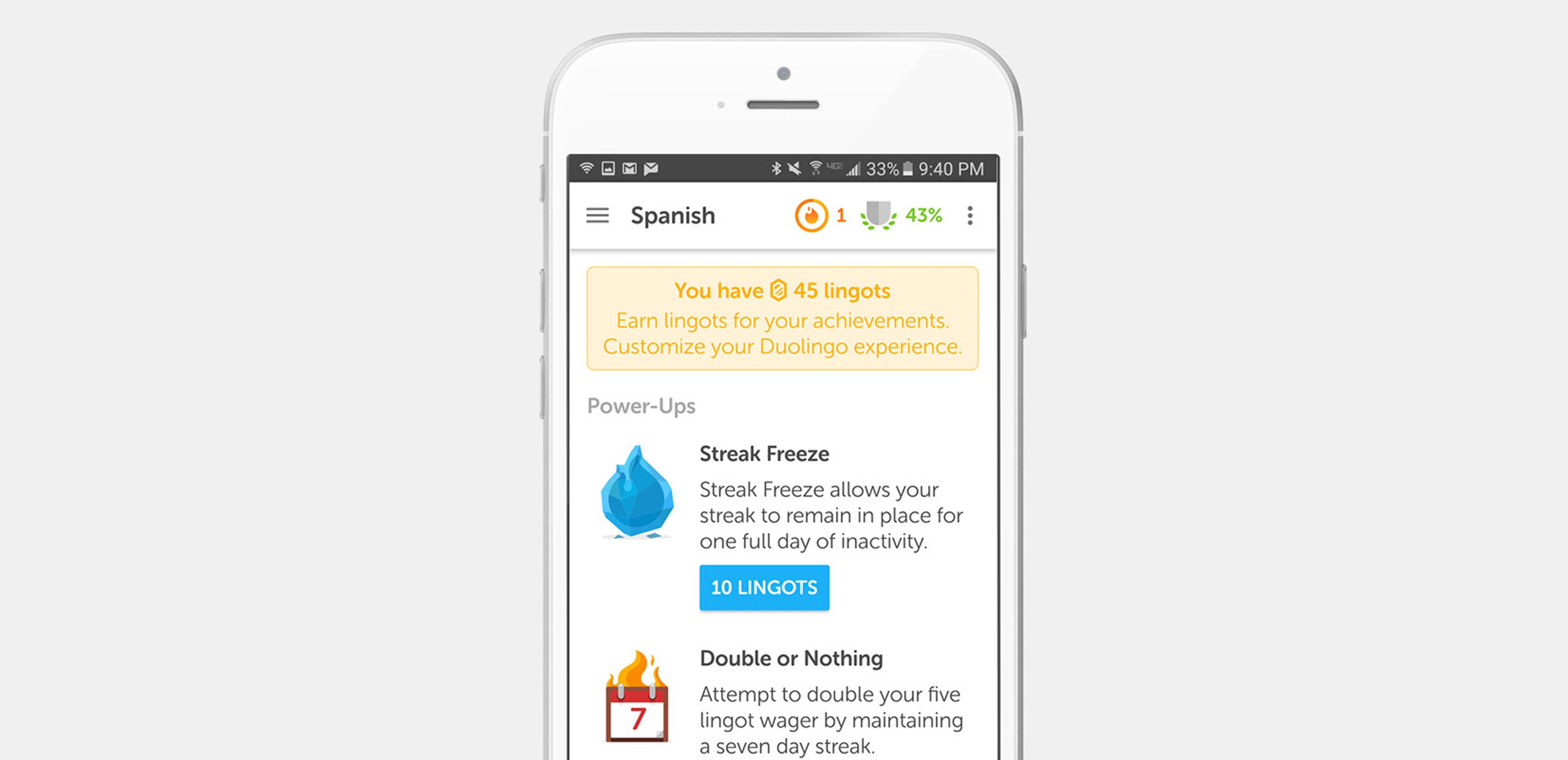 A smartphone screen displaying the Duolingo app, showing a Spanish language section with progress details and power-up options.