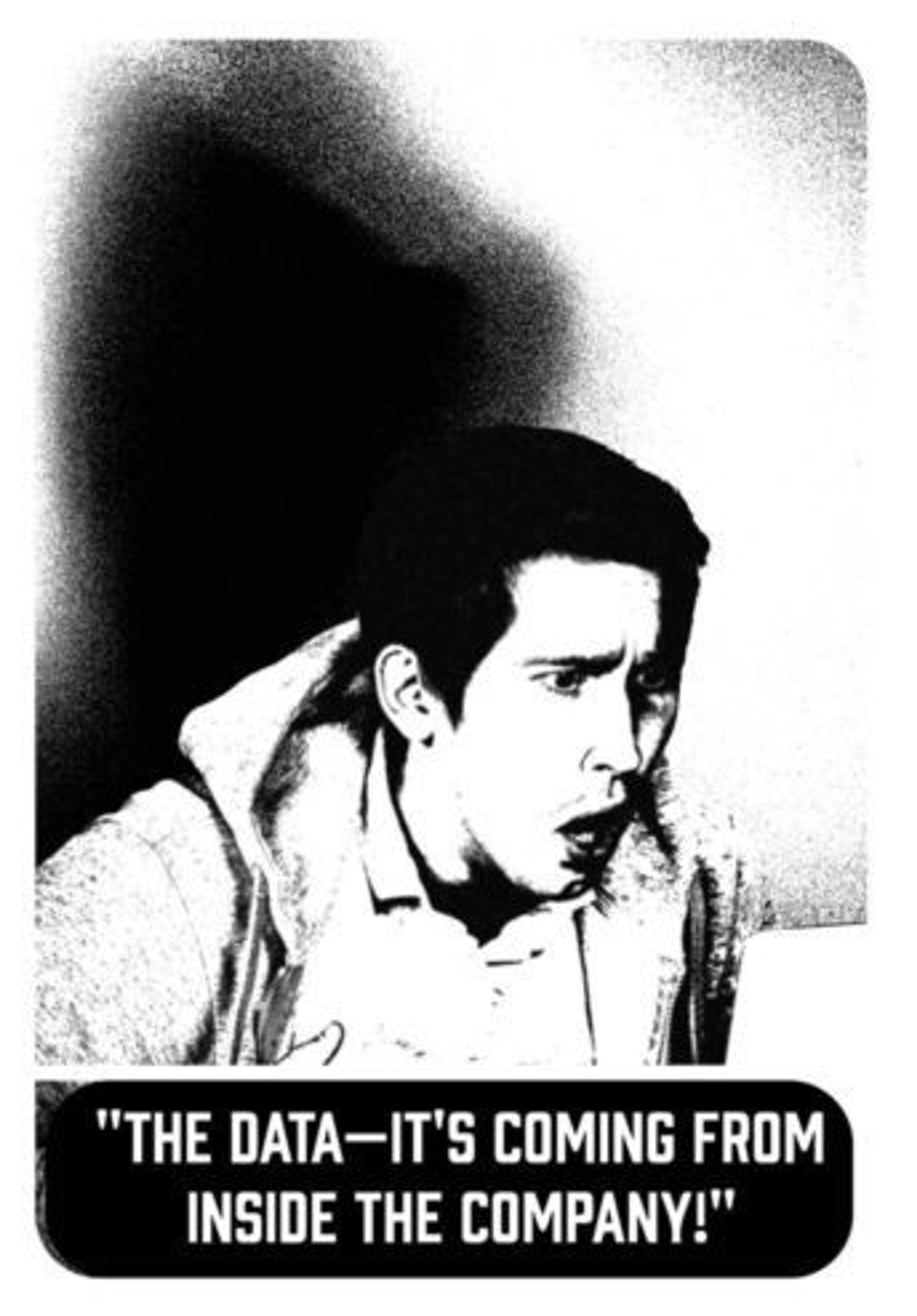 A shocked man exclaims, "The data—it's coming from inside the company!" while looking at a computer screen. The image has a high-contrast black and white effect.
