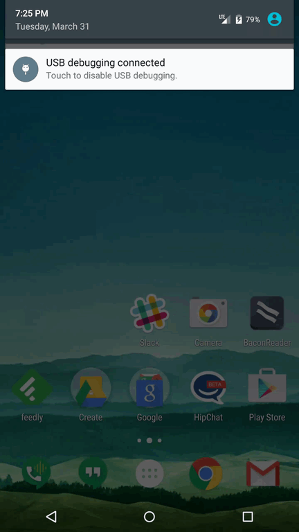 A smartphone screen displaying the notification "USB debugging connected" at 7:25 PM on March 31, with various app icons visible below.