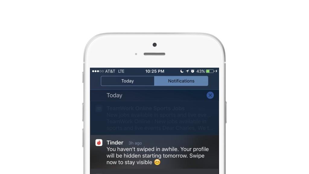 A smartphone screen displaying a Tinder notification about swiping activity. The message indicates that the user's profile will be hidden if they do not swipe soon.