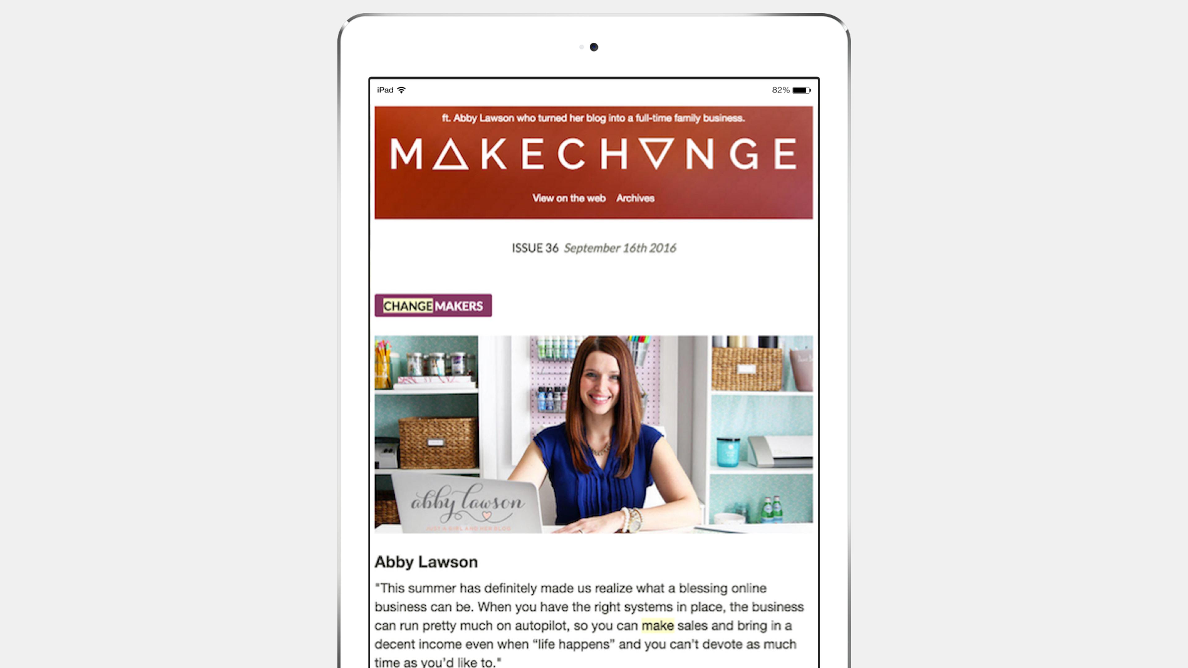 A woman sits at a desk with craft supplies, smiling at the camera. The image is part of a digital magazine titled "MAKECHANGE.
