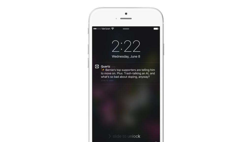 A smartphone displaying a notification from Quartz about Bernie Sanders and discussions on AI and doping. The time is 2:22 PM on June 8.