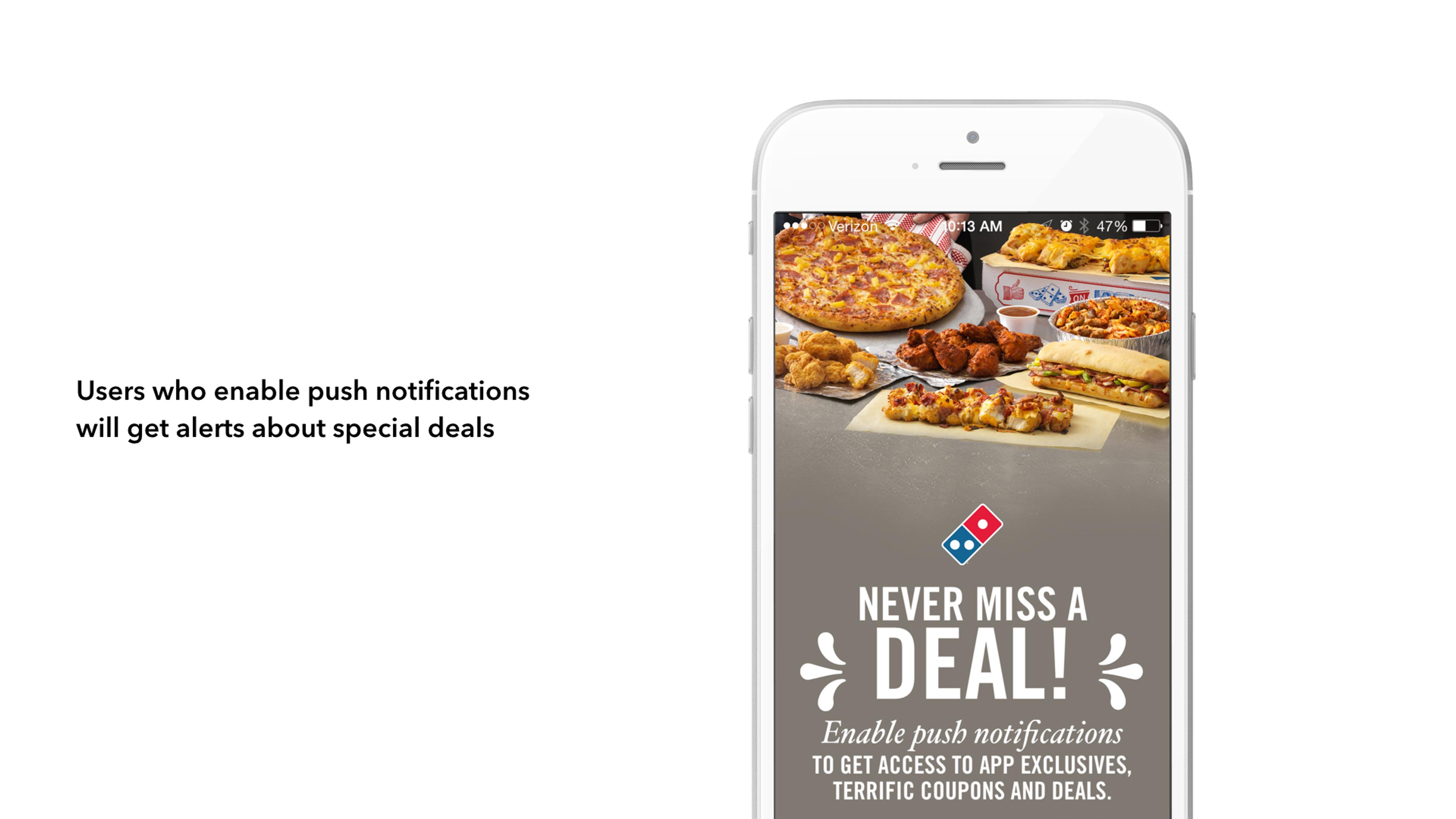 A smartphone displays a promotional message for Domino's, highlighting special deals and push notifications for app users. Various food items, including pizza and sides, are arranged on a table.
