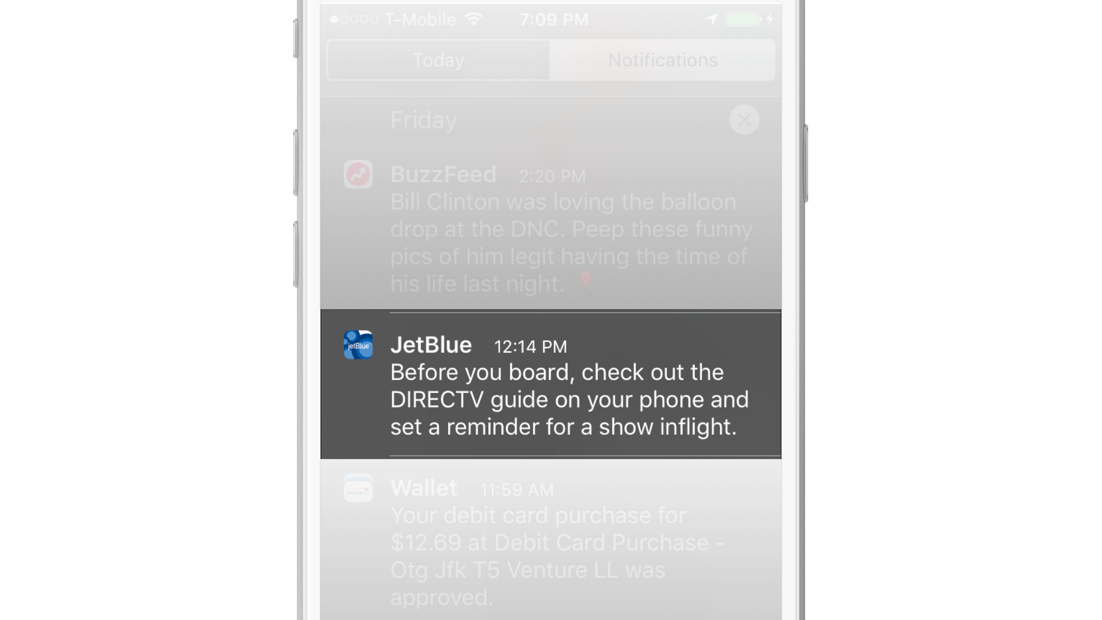 A smartphone screen displaying a notification from JetBlue about checking the DIRECTV guide and setting a reminder for an inflight show. The background includes other notifications and a date at the top.