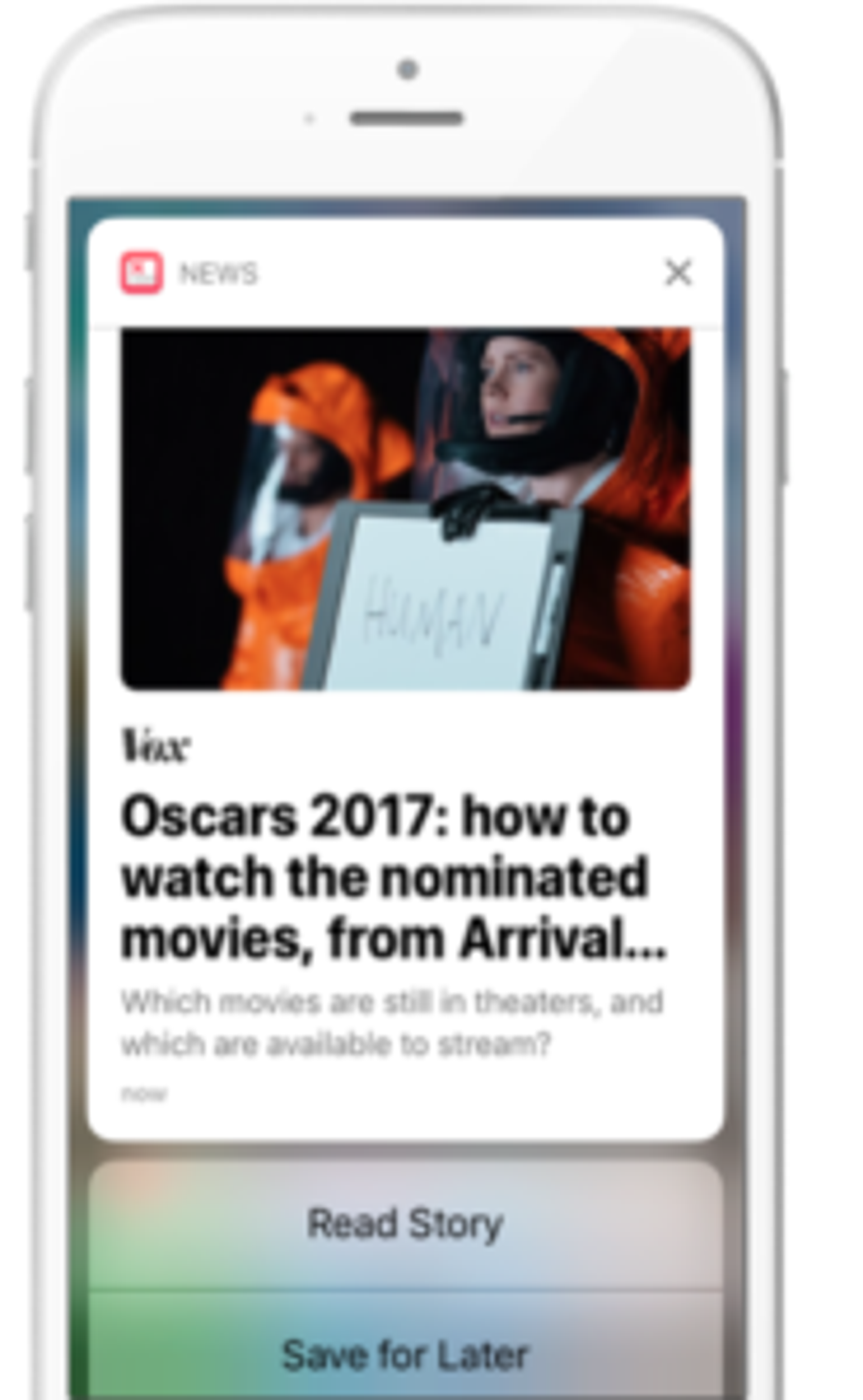 A smartphone screen displaying a news notification about the 2017 Oscars, featuring an article from Vox. The notification includes options to read the story or save it for later.