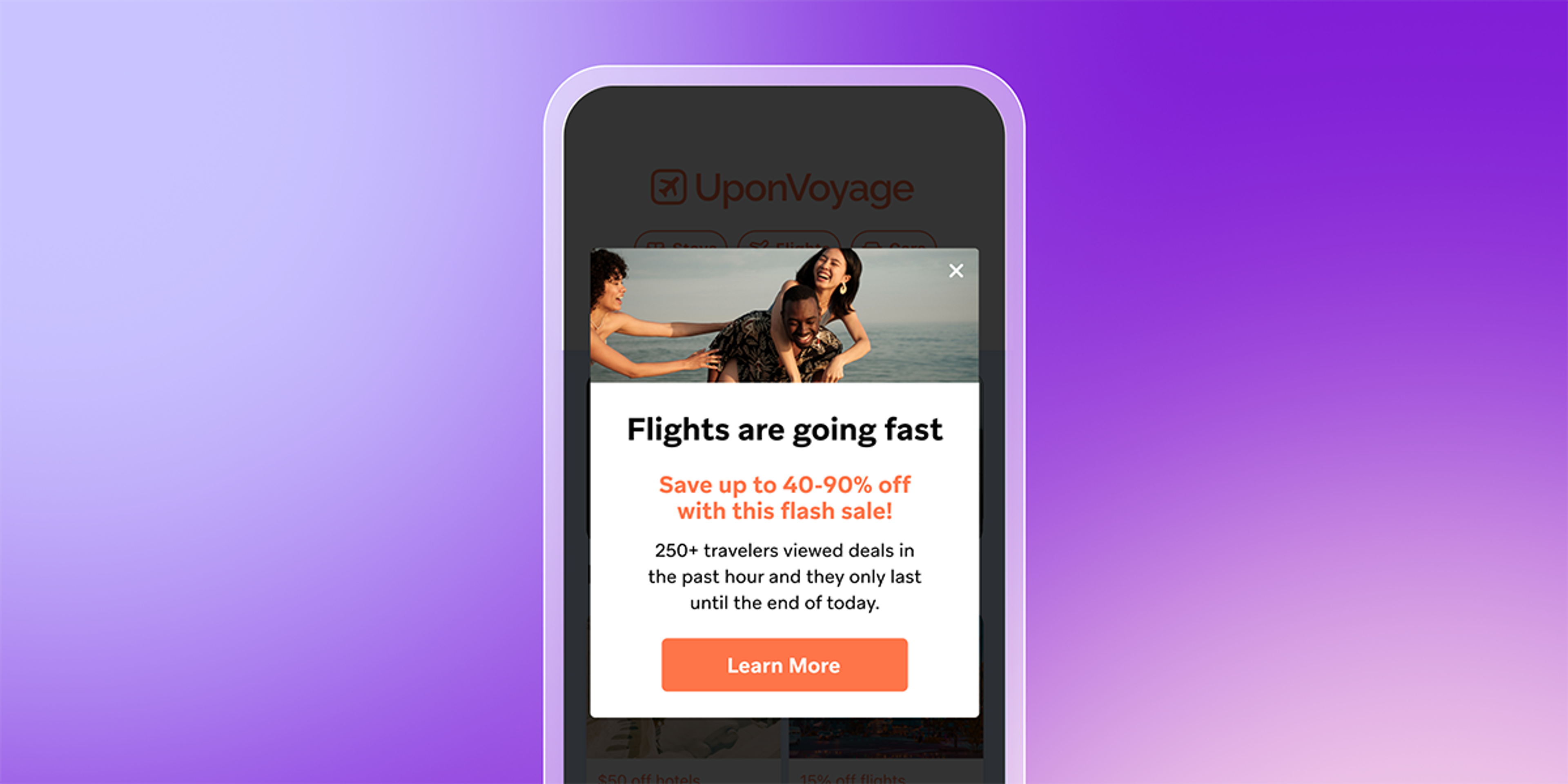 A smartphone displays a travel app with a pop-up advertising a flight flash sale offering up to 90% off, featuring two people by the sea.