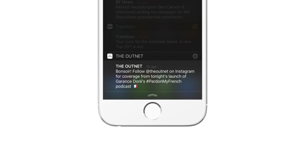 A smartphone screen displaying a notification from The Outnet about following their Instagram for coverage of a podcast launch. The notification includes a greeting in French and an Italian flag emoji.