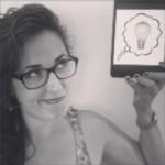 A woman with glasses holds a tablet displaying a light bulb icon in a thought bubble. She looks thoughtfully at the tablet.