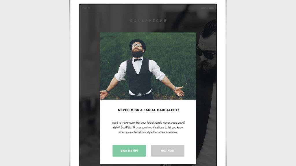 A man with a beard and mustache wearing a bow tie and suspenders stands with arms outstretched in front of a grassy background. A promotional message about facial hair style notifications is displayed below him.