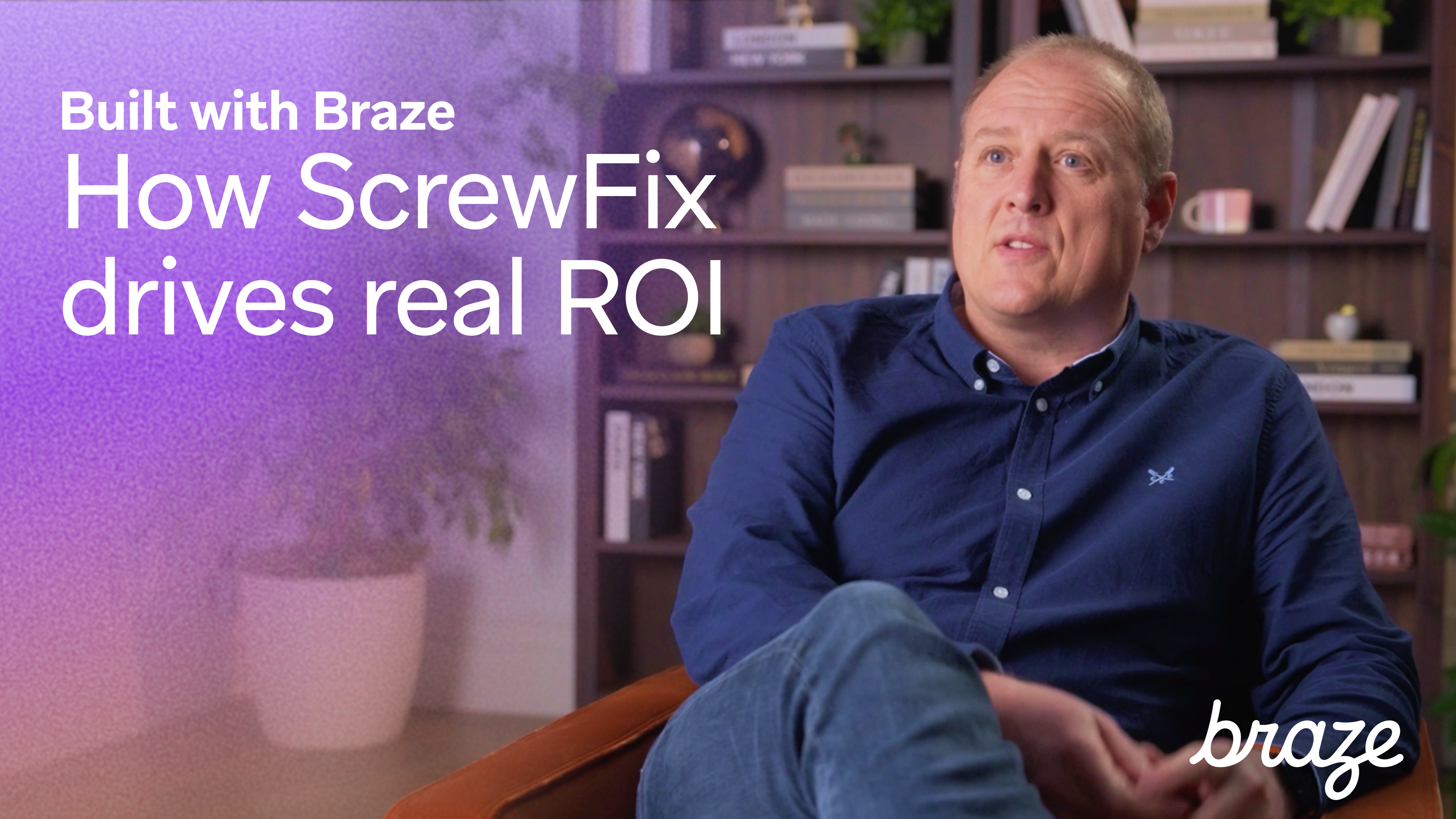A man sits in an office beside the text “Built with Braze: How ScrewFix drives real ROI.”