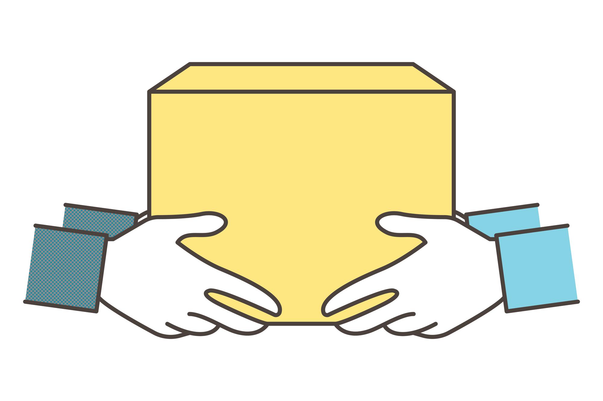 a couple of hands holding a cardboard box .