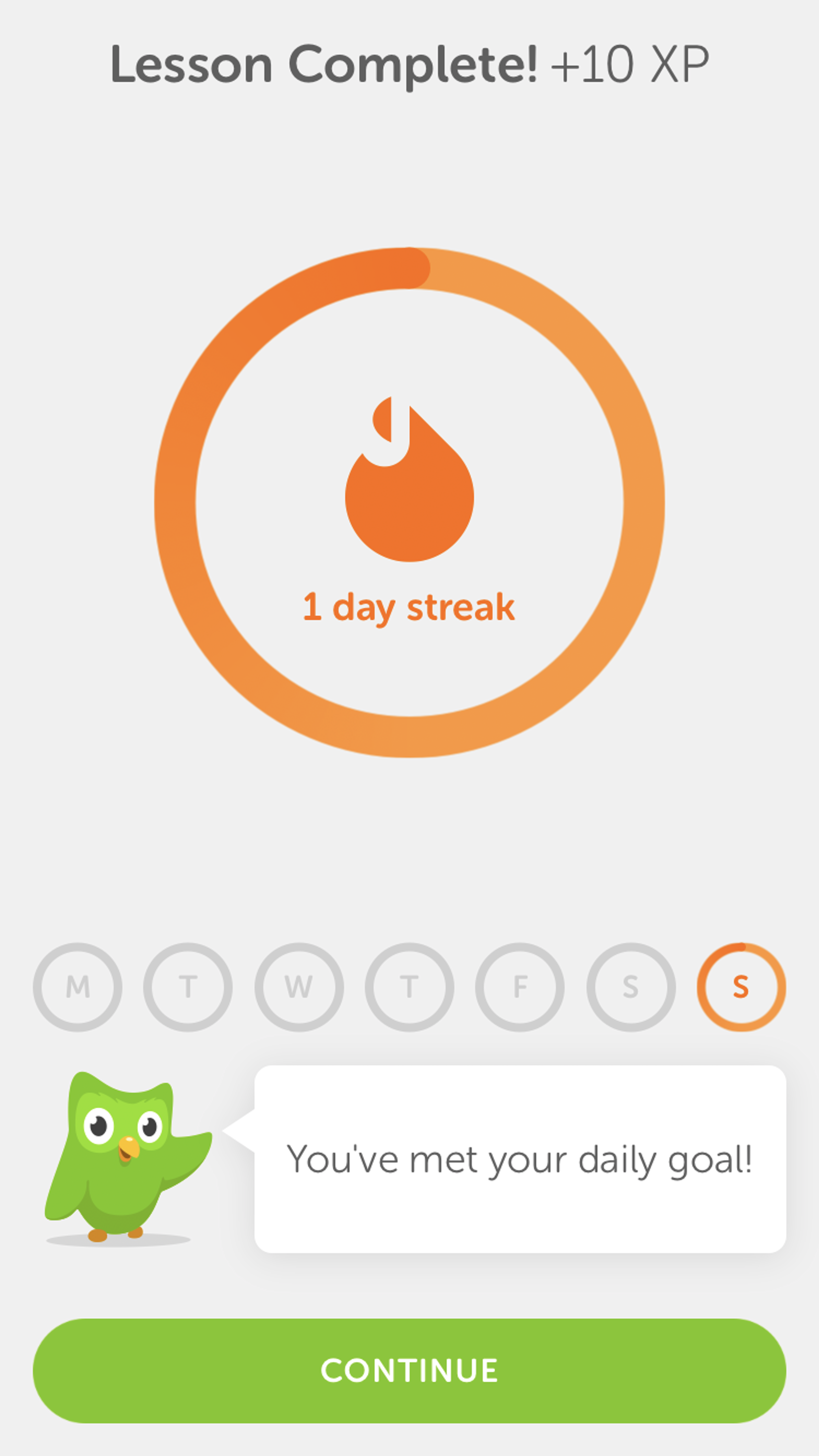 A progress screen showing "Lesson Complete!" with a circular progress indicator and a message stating "You've met your daily goal!