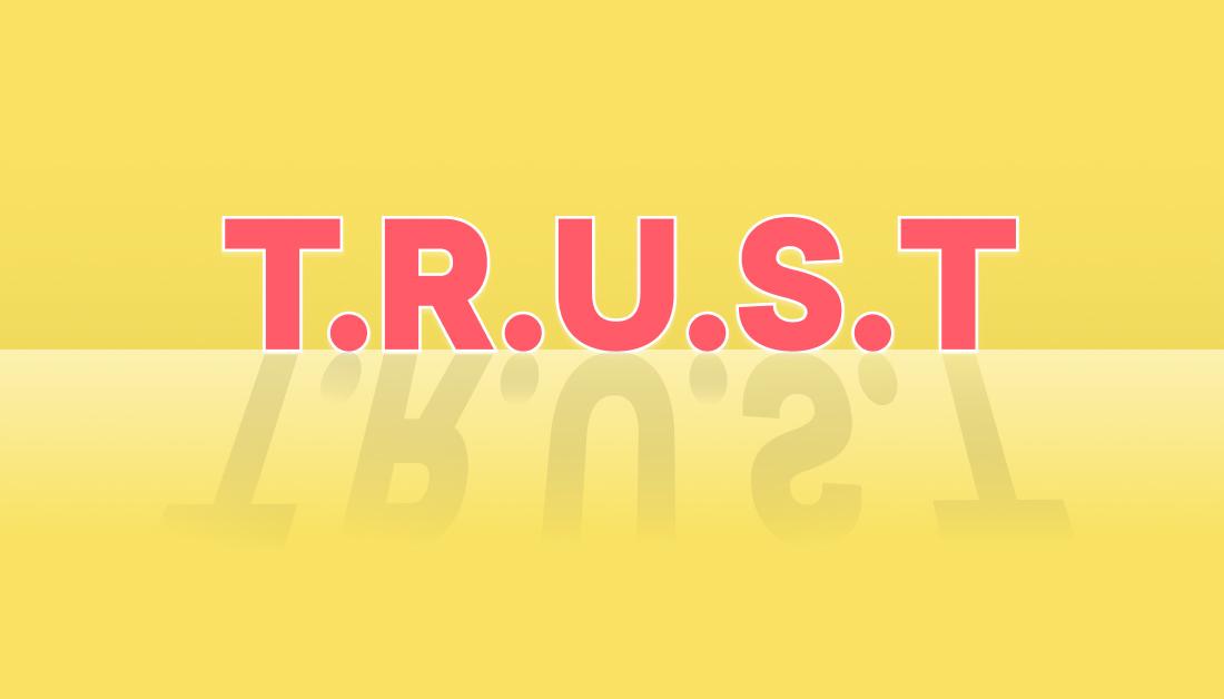 The word "T.R.U.S.T." is displayed in bold pink letters against a yellow background, with a reflective surface below.