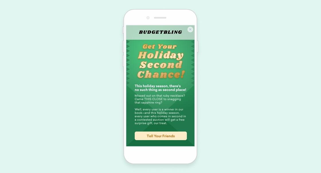 A mobile phone displays a promotional message for BudgetBling's holiday sale, encouraging users to share with friends about a second chance to get holiday items. The background features festive green decorations.