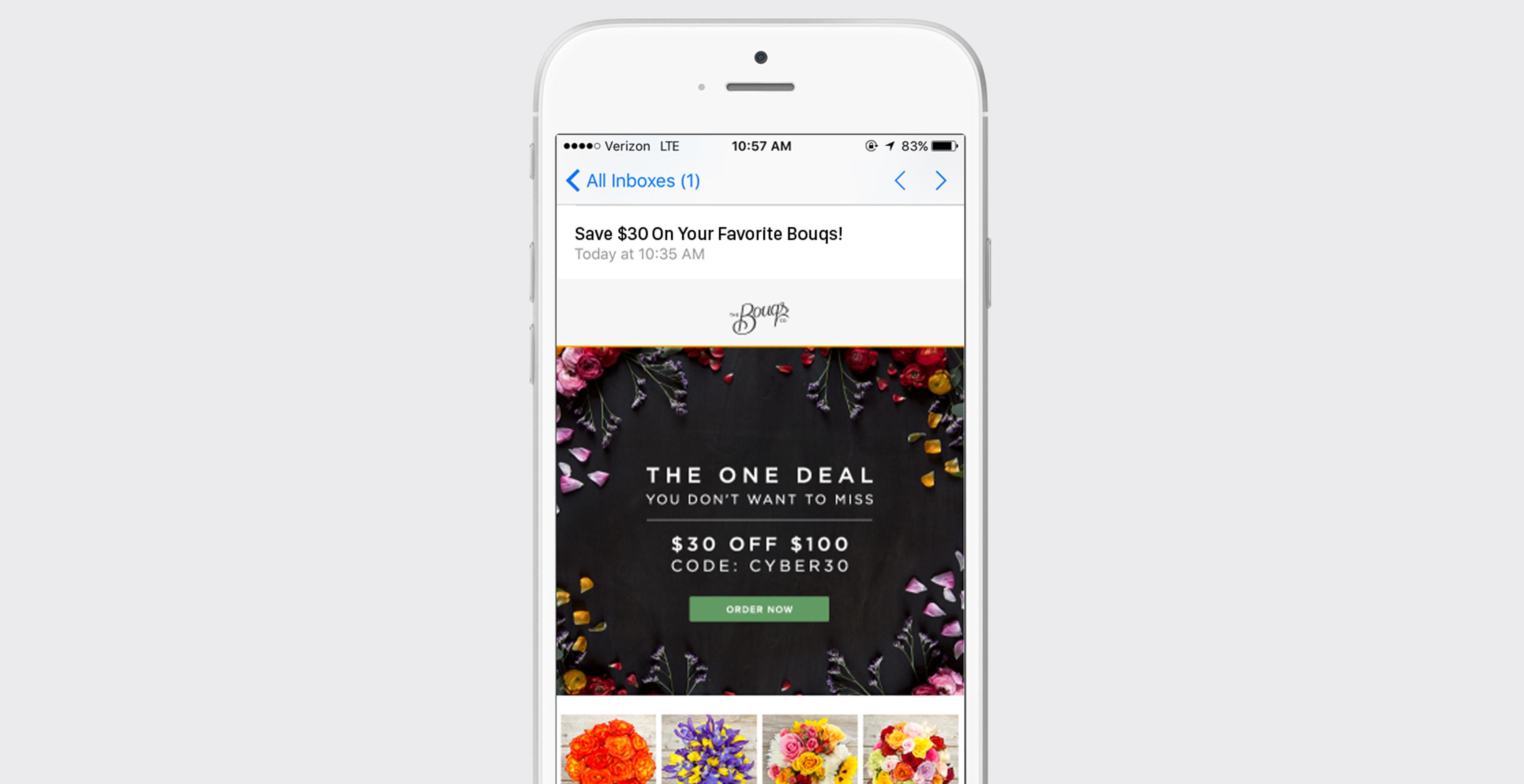 An email on a smartphone screen advertising a $30 discount on flower bouquets with a promotional code. The background features colorful floral arrangements.